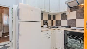 Standard Apartment, Balcony, Garden View | Private kitchen | Full-size fridge, microwave, oven, stovetop