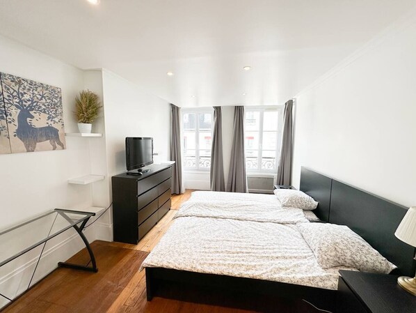 2 habitaciones, tabla de planchar con plancha, wifi y ropa de cama 