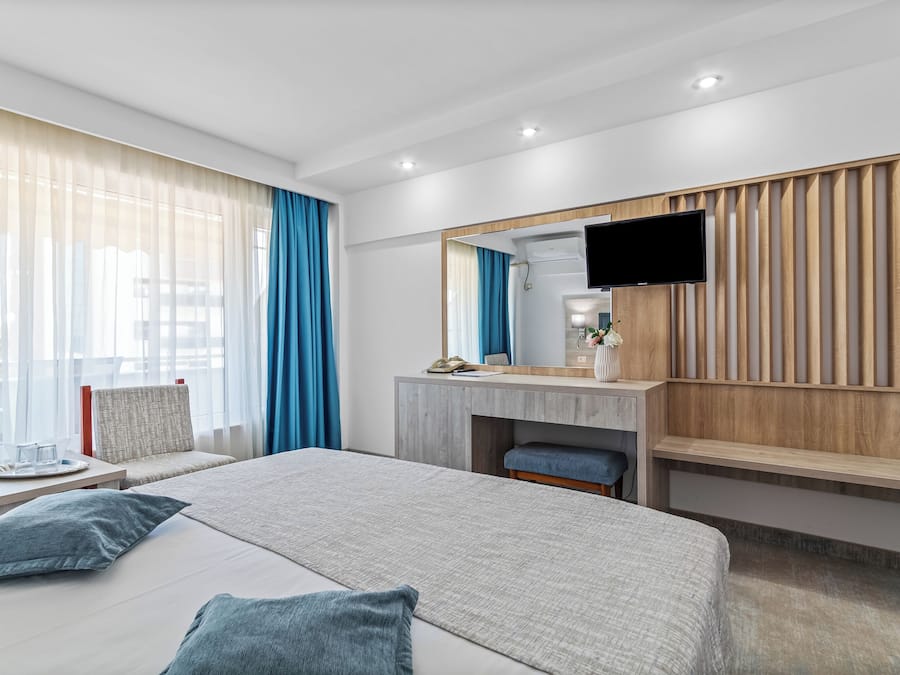 Comfort Double Room, Balcony | In-room safe, desk, blackout curtains, iron/ironing board