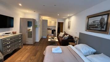 1 chambre, coffres-forts dans les chambres, fer et planche à repasser