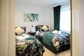 3 chambres, fer et planche à repasser, Wi-Fi gratuit