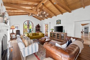 TV, fireplace - Home with Pickleball Court, Pool Table, and Saltwater Pool! Walk to Downtown! (Palm Springs)