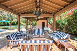Outdoor dining - Home with Pickleball Court, Pool Table, and Saltwater Pool! Walk to Downtown! (Palm Springs)