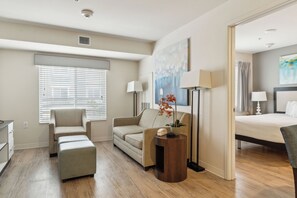 1 bedroom, desk, iron/ironing board, travel crib