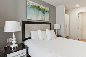 1 bedroom, desk, iron/ironing board, travel crib