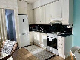 Apartamento conforto, 1 quarto, vista para o pátio | Cozinha privada