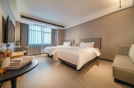 Twin Room, City View | Blackout drapes, soundproofing, free WiFi