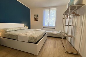 1 habitación, tabla de planchar con plancha, wifi y ropa de cama 