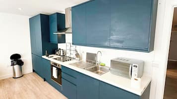 Apartment, 2 Bedrooms (132 A) | Private kitchen | Fridge, microwave, oven