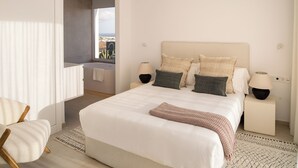 Une chambre moderne avec un grand lit, deux tables de chevet, une chaise et une vue sur la ville par la fenêtre.