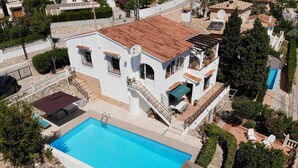 A two-story building with a swimming pool, outdoor seating, and a garden. - 🏡 Casita Baladrar | Private Pool and 5 Minutes from the Beach (Benissa)