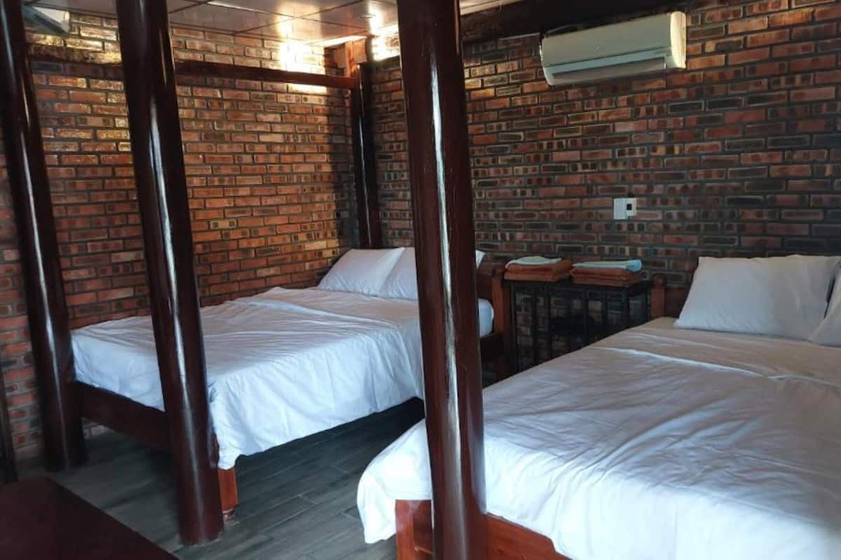 Quarto quádruplo luxo, vista para o jardim | Wi-Fi de cortesia, roupa de cama