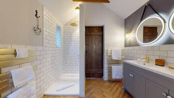 Shower, hair dryer, towels, soap
