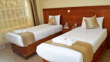 Kamar Twin Deluks, pemandangan kebun | Wi-Fi gratis dan seprai linen