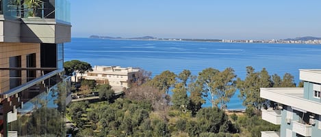 A modern building with a view of the sea.