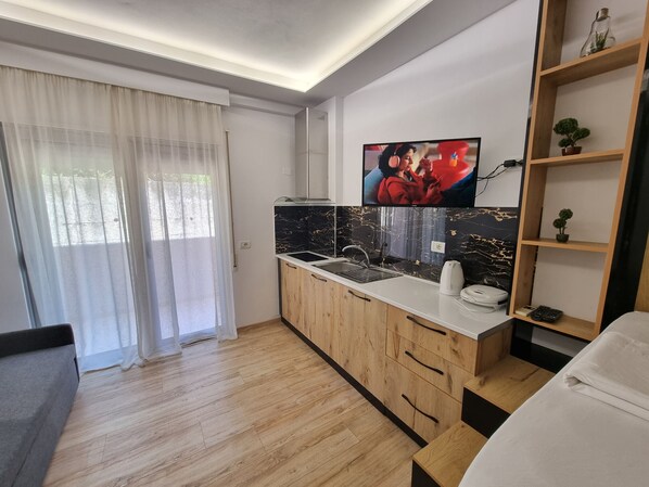 1 habitación, tabla de planchar con plancha, wifi gratis y ropa de cama 