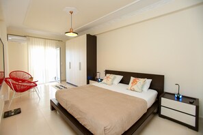 1 chambre, coffres-forts dans les chambres, fer et planche à repasser