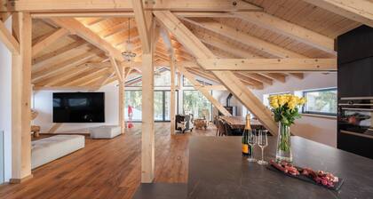 Luxury chalet with panorama, sauna, steam bath, hot tub & cinema, fondue house, and much more.