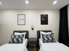 2 bedrooms, desk, iron/ironing board, travel cot