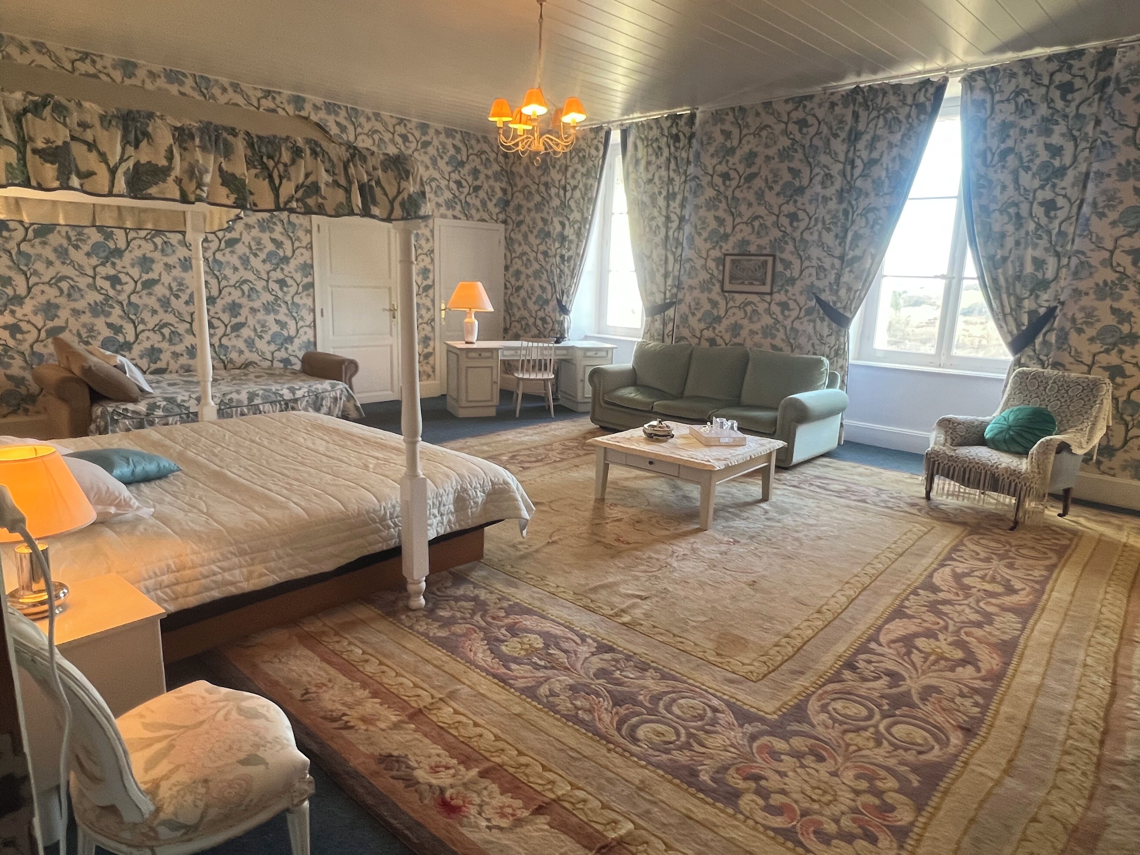 Neljän hengen deluxe-huone, näköala puutarhaan (Bleu)