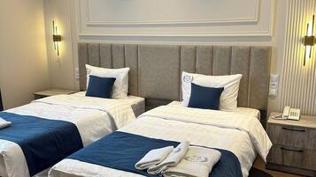 Comfort Double or Twin Room, City View | 1 bedroom, in-room safe, desk, laptop workspace