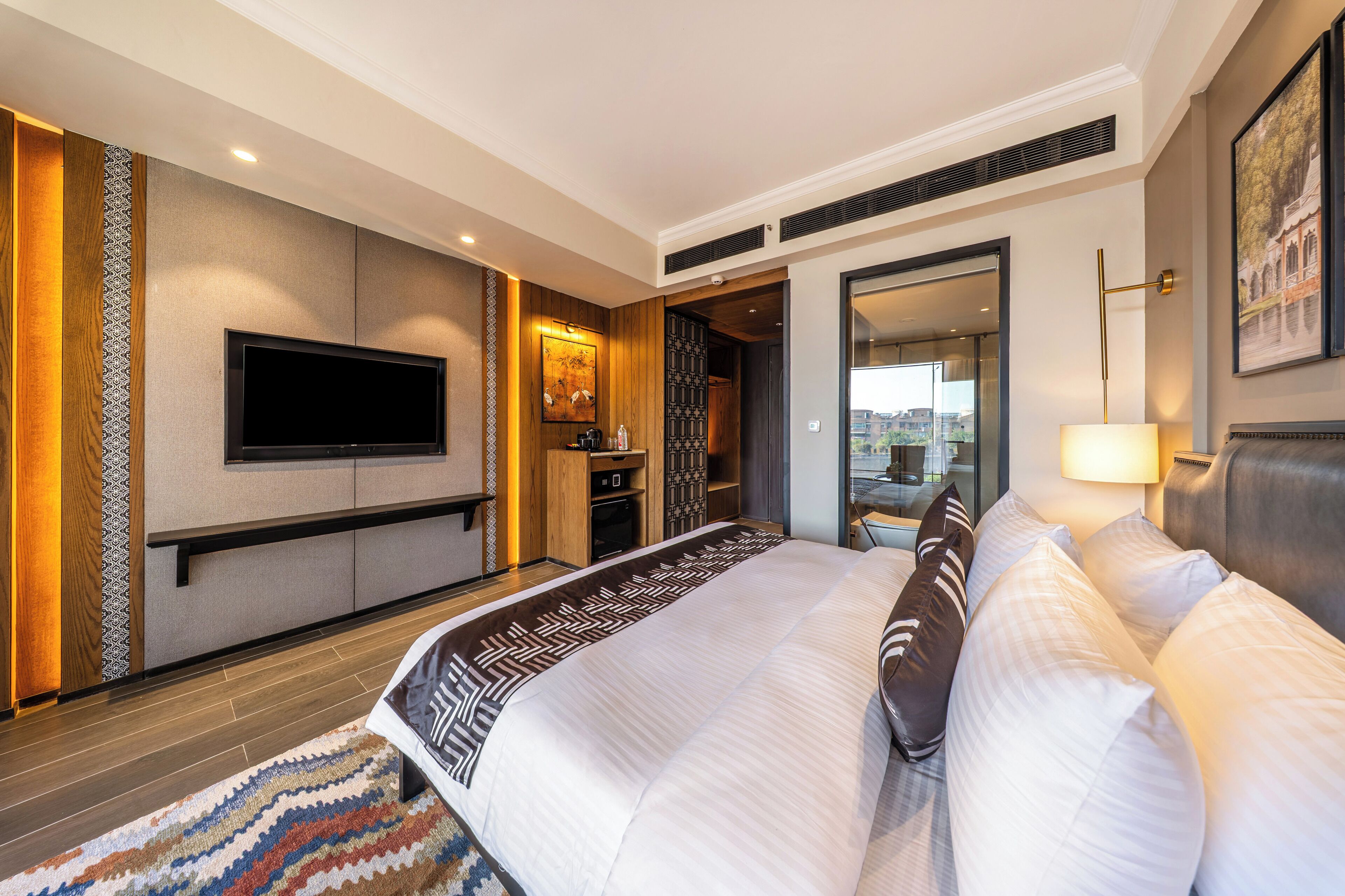 Premium Room with Lounge Area | Desk, iron/ironing board, bed sheets