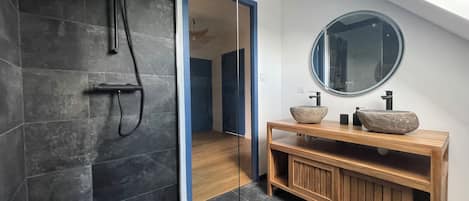 Shower, hair dryer, soap, toilet paper