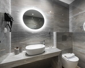 Shower, hydromassage showerhead, hair dryer, towels