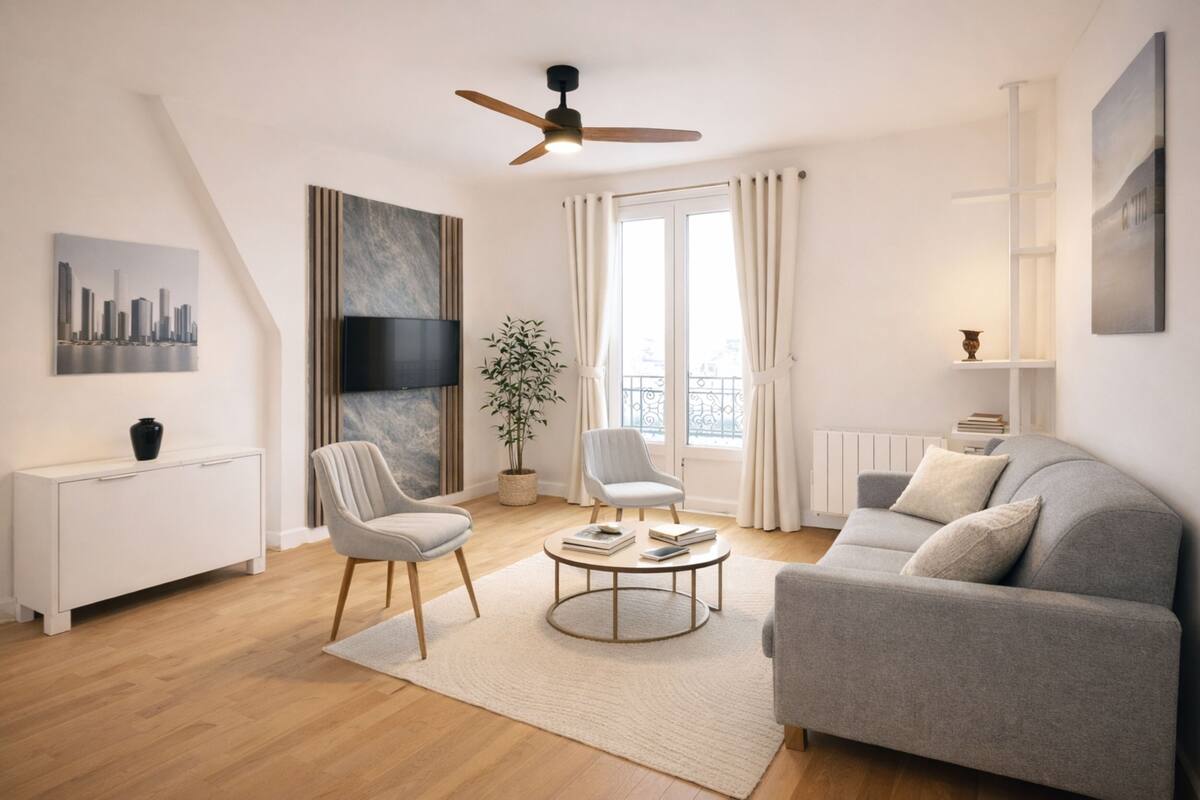 A modern living room with a sofa, two armchairs, a coffee table, a TV, a ceiling fan, a potted plant, and a cityscape painting.
