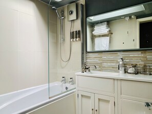 Hair dryer, towels, soap, shampoo