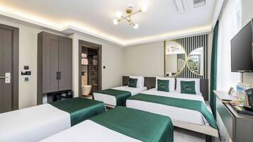 Premium bedding, free minibar items, in-room safe, desk