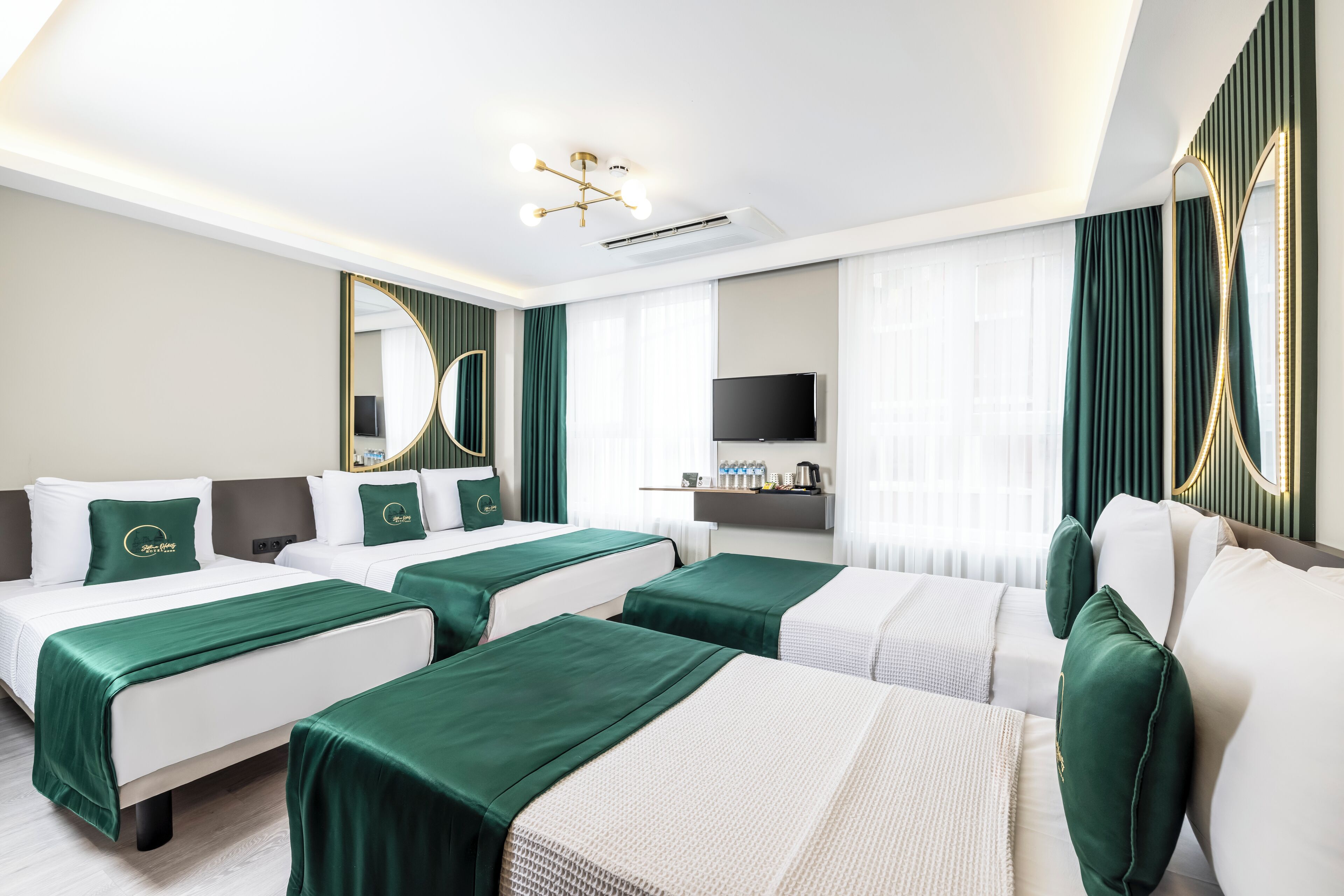 Comfort Quadruple Room, City View, Ground Floor | Premium bedding, free minibar items, in-room safe, desk