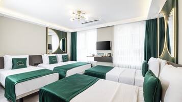 Comfort vierpersoonskamer, uitzicht op stad, op benedenverdieping | Luxe beddengoed, een minibar met enkele gratis items