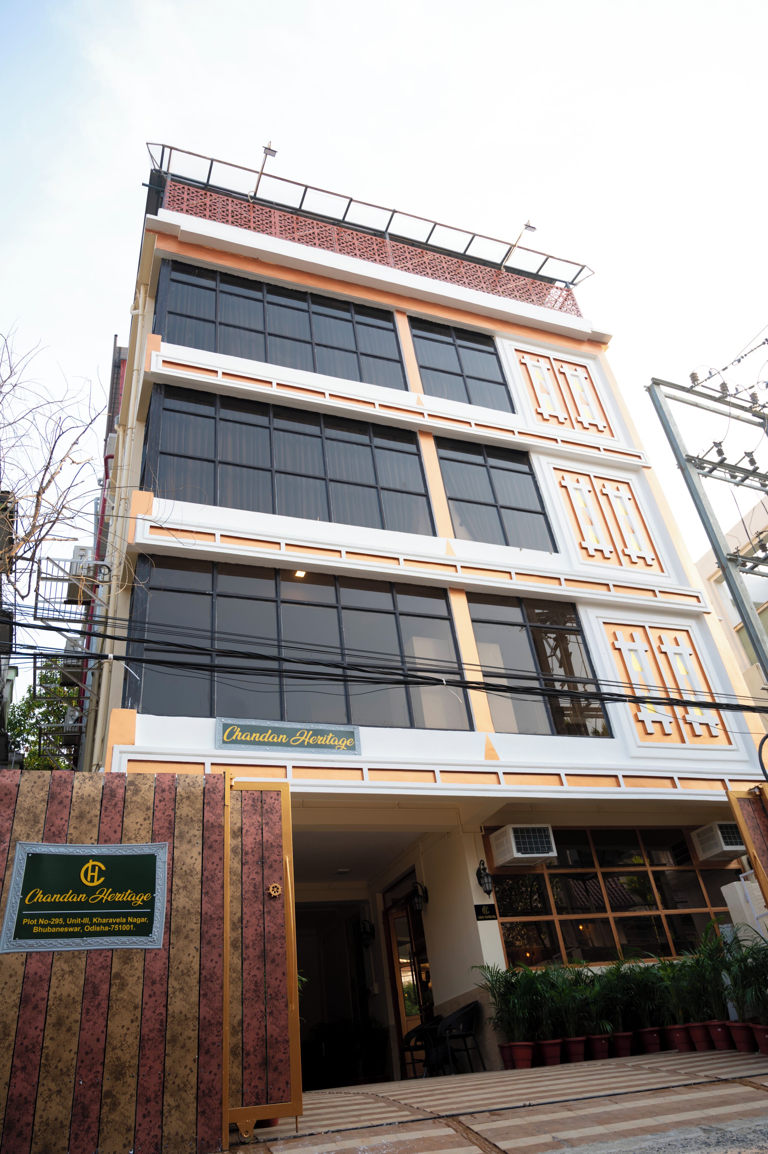 A multi-story building with a sign reading "Chandan Heritage."