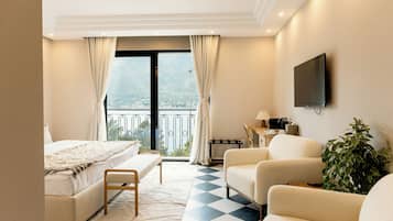 Deluxe-Doppelzimmer, Meerblick | 1 Schlafzimmer, Minibar, Zimmersafe, Verdunkelungsvorhänge