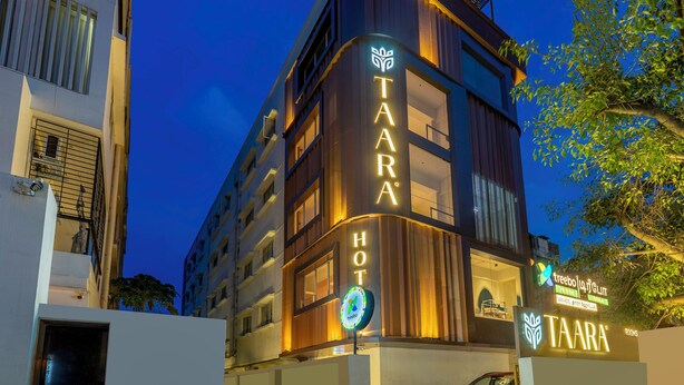 A hotel named TAARA HOT with a modern design, featuring a prominent sign and a logo. - Treebo Premium Taara (Chennai)