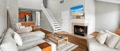 Smart TV, fireplace, books