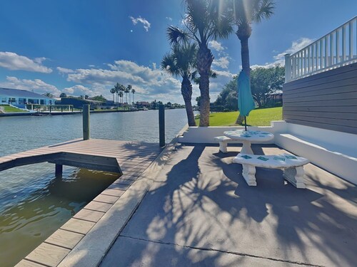 Dolphin View Oasis | Spacious Pet-Friendly Canal-front Home with Game Room+ Dock