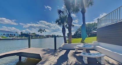 Dolphin View Oasis | Spacious Pet-Friendly Canal-front Home with Game Room+ Dock