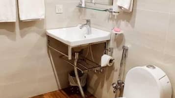 Shower, free toiletries, towels, soap