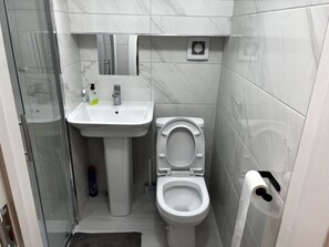 Shower, free toiletries, towels, soap