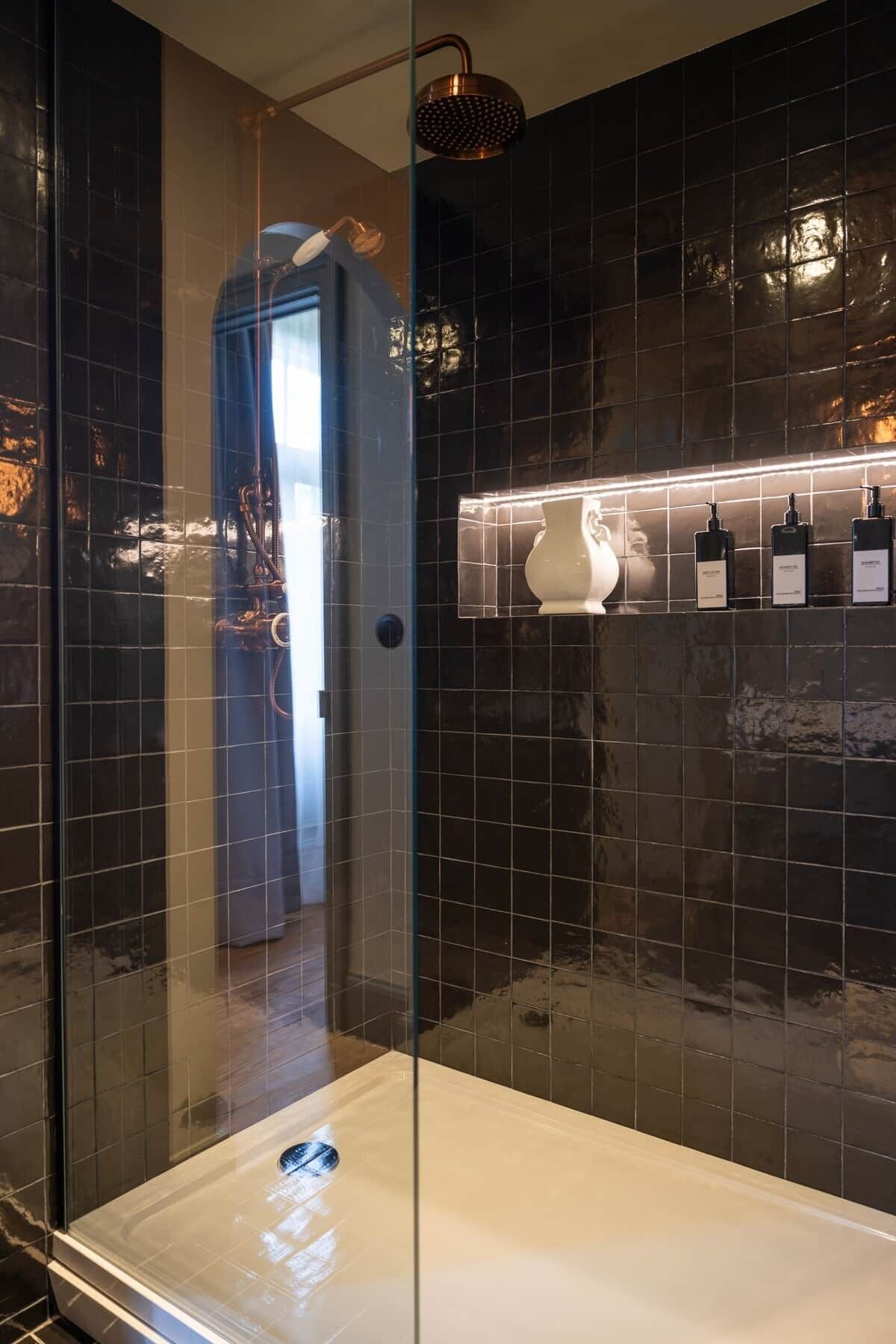 Shower, hair dryer, soap, toilet paper