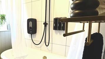 Shower, eco-friendly toiletries, hair dryer, towels