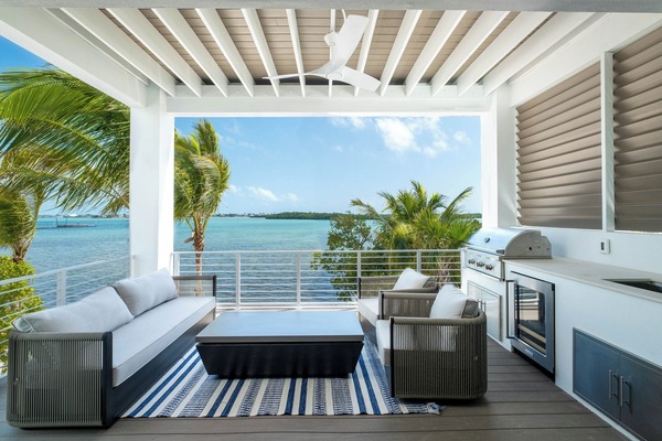 Outdoor oasis with grill and stunning ocean views—perfect for sunset dining