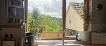 Charming Cotswold stone cottage with garden, off-road parking and valley views