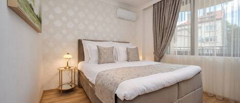 1 slaapkamer, een strijkplank/strijkijzer, wifi, beddengoed