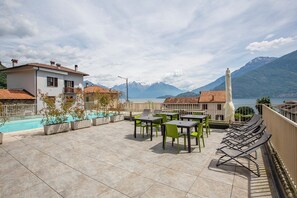 Outdoor dining - Larius Apartment-Residence with Pool on Lake Como (Musso)