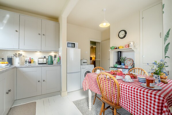 Fridge, microwave, oven, cookware/dishes/utensils
