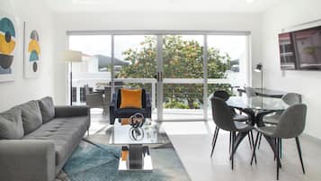 Luxury Apartment, 232A Upper Level | Living area | Smart TV