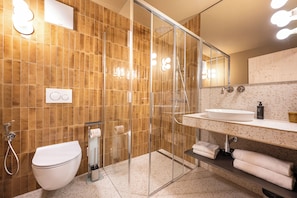 Shower, hair dryer, slippers, towels